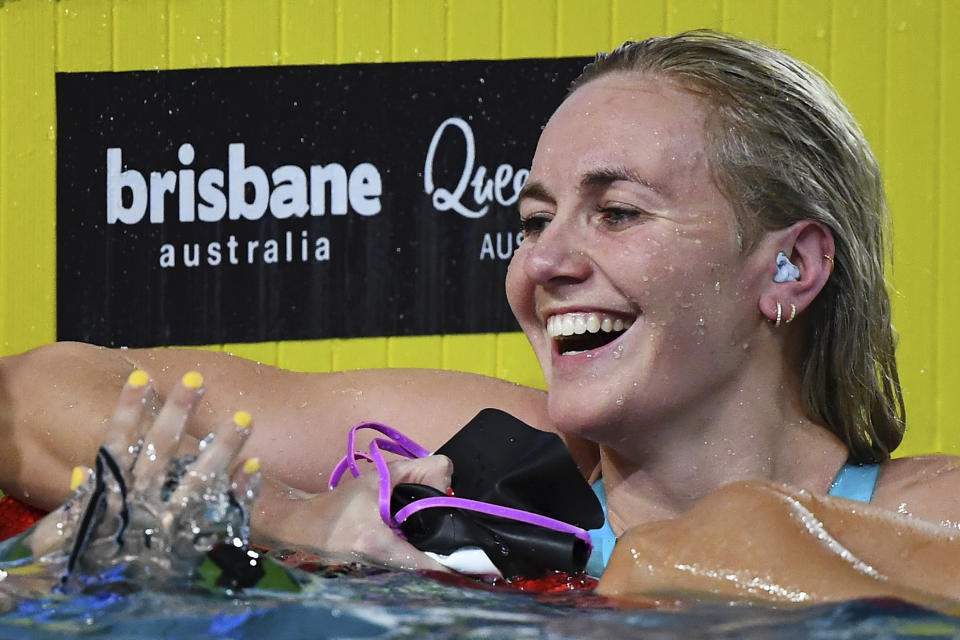 Ariarne Titmus reacts after winning the final of the Women's 200m Freestyle during the 2024 Australian Swimming Trials at the Brisbane Aquatic Centre in Brisbane, Wednesday, June 12, 2024. Titmus set a world record in the women’s 200-meter freestyle on Wednesday at Australia’s Olympic swimming trials on Wednesday.(Jono Searle/AAP Image via AP)
