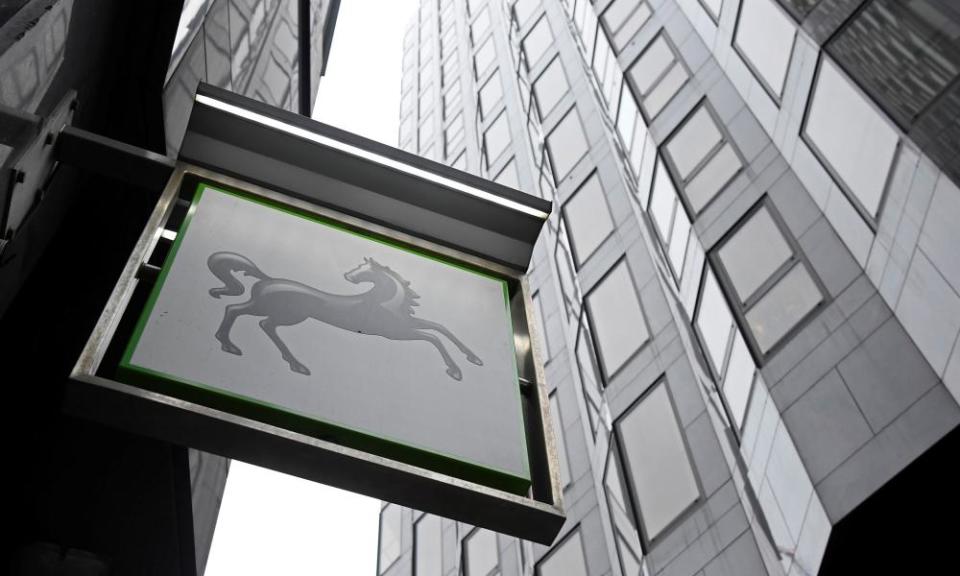 A sign hangs outside a branch of Lloyds