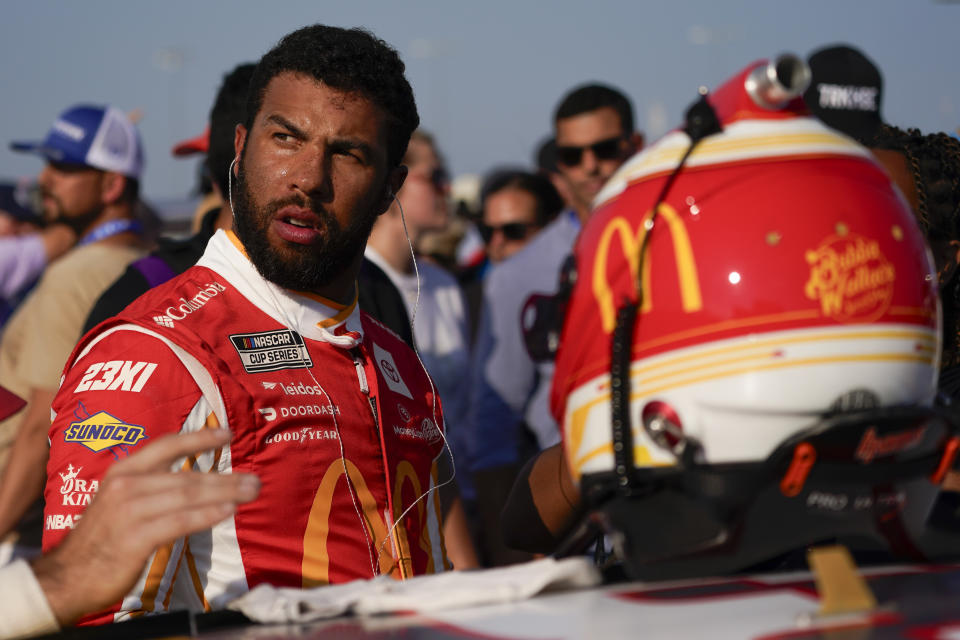 Bubba Wallace prepares for the start of a NASCAR Cup Series auto race, Sunday, June 25, 2023, in Lebanon, Tenn. (AP Photo/George Walker IV)