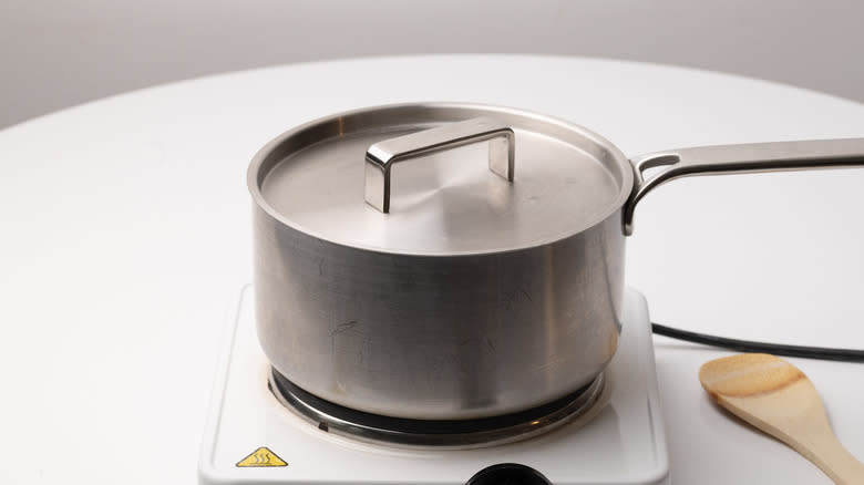 saucepan on heat source 