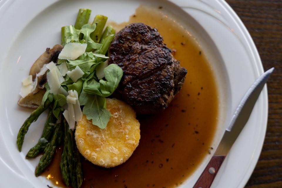 Primavista’s center-cut filet mignon is topped with a veal glaze and served with a Parmesan polenta and greens.