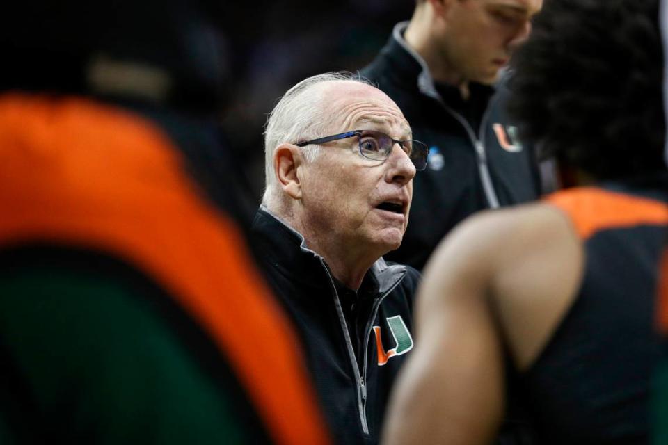 Miami Hurricanes head coach Jim Larranaga talks to his team during a timeout in the first half of an NCAA tournament Midwest Regional semifinal against the Houston Cougars at T-Mobile Center.