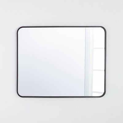 <p><strong>Threshold x Studio McGee</strong></p><p>target.com</p><p><strong>$70.00</strong></p><p><a href="https://www.target.com/p/24-x-36-rectangular-decorative-mirror-with-rounded-corners-threshold-designed-with-studio-mcgee/-/A-81078369" rel="nofollow noopener" target="_blank" data-ylk="slk:BUY NOW;elm:context_link;itc:0;sec:content-canvas" class="link ">BUY NOW</a></p><p>Whether you style it horizontally or vertically, this mirror looks great in virtually any room in your home, including your bathroom, entryway, or on top of a dresser in your bedroom. </p>