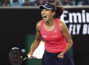 China's Zhang Shuai celebrates after defeating United States' Sloane Stephens in their first round singles match the Australian Open tennis championship in Melbourne, Australia, Monday, Jan. 20, 2020. (AP Photo/Dita Alangkara)