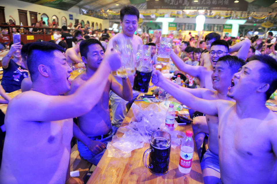 This photo taken on Aug. 7, 2017 shows people toasting at the annual Qingdao Beer Festival in China's eastern Shandong province.