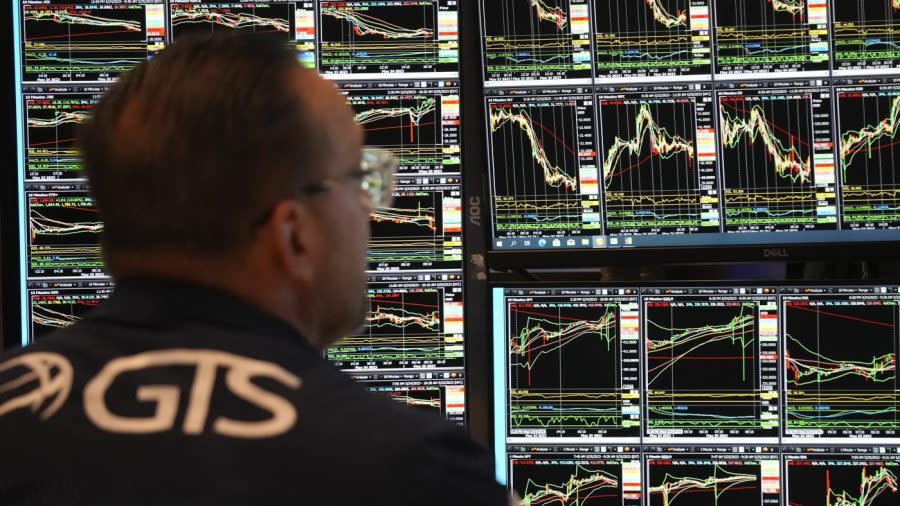 Traders work on the floor at the New York Stock Exchange in New York, Thursday, May 25, 2023. (AP Photo/Seth Wenig)