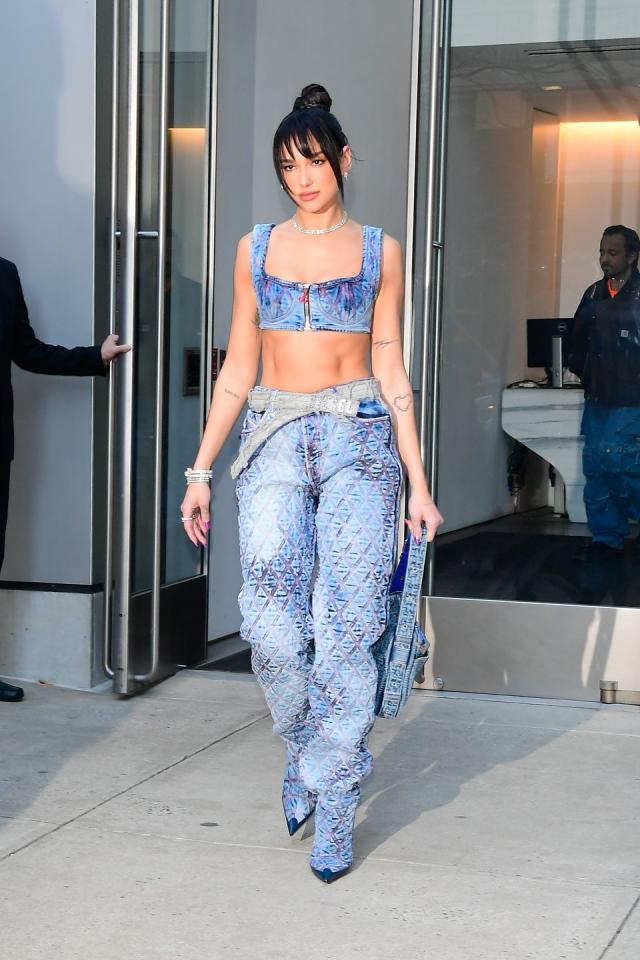 Dua Lipa wows in a denim bra and matching skirt as she celebrates