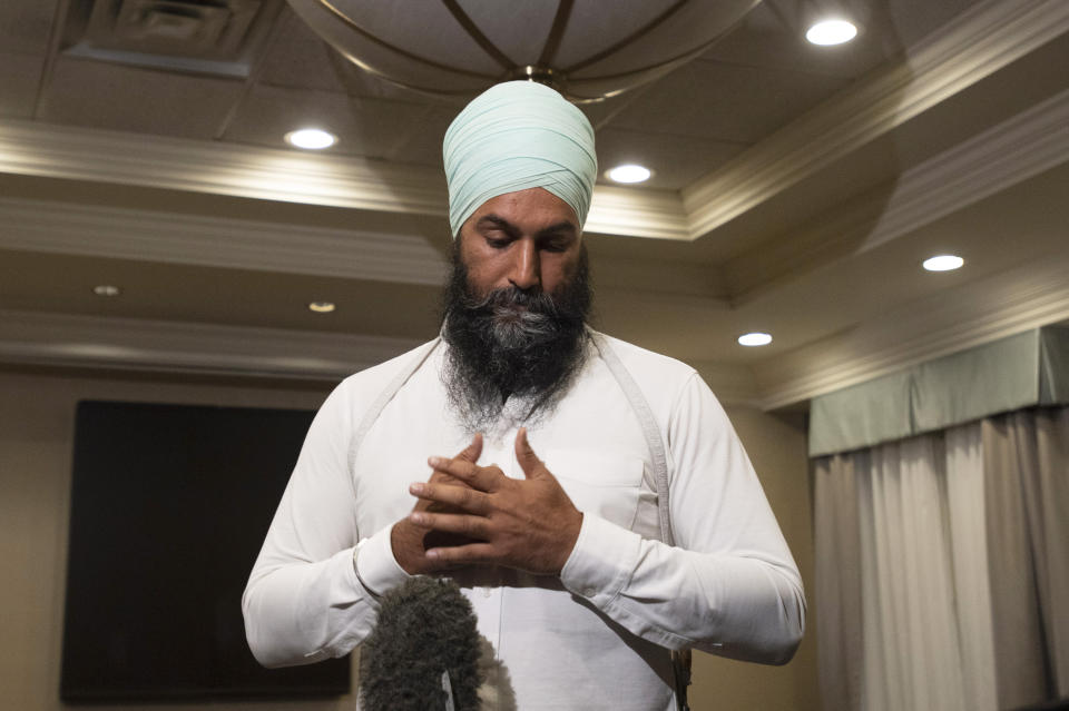 New Democratic Party Leader Jagmeet Singh comments on a photo from 2001 surfacing of Canadian Prime Minister and Liberal leader Justin Trudeau, when he was a teacher wearing "brownface at a party," as he makes a statement in Toronto, Wednesday September 18, 2019. (Adrian Wyld/The Canadian Press via AP)