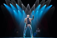 This image released by O&M/DKC shows Mark Jacoby as Neil Diamond during a performance of the musical “A Beautiful Noise." (Julieta Cervantes/O&M/DKC via AP)