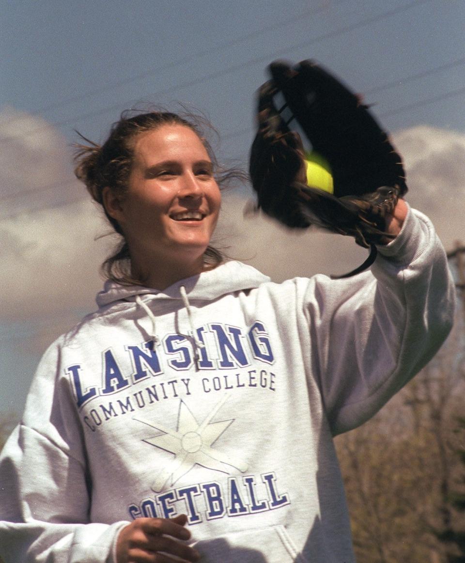 Jodi Every practices her catching along with the rest of the Lansing Community College softball team in 2000. Every was the leading hitter for the Stars during a season they finished as the national runner-up.