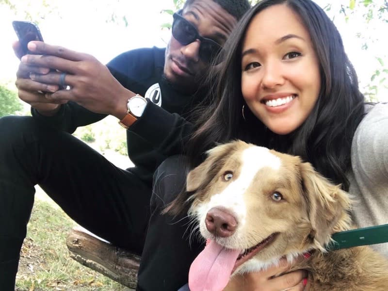 Kerron Johnson is shown with his wife, Gina, and dog Kota. (Photo credit: Johnson family)