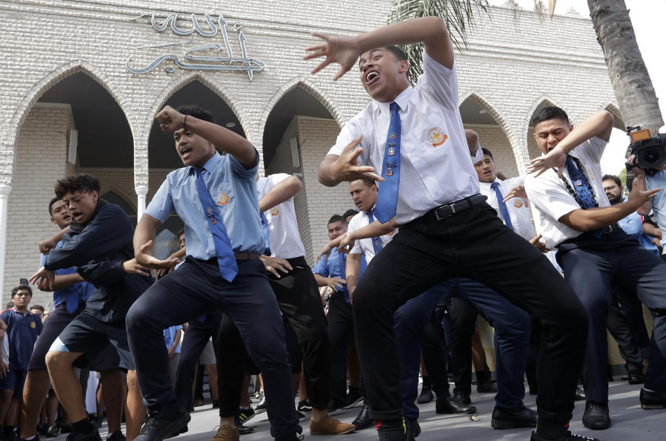 Students from Punchbowl Boys High School perform the New Zealand Maori tradition dance called a haka after Friday prayers at Imam Ali bin Abi Taleb Mosque in Sydney, Australia, Friday, March 22, 2019. The performance is to show support for New Zealand Muslims after 50 people were killed in attacks at Christchurch mosques last week. (AP Photo/Rick Rycroft)