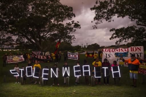 Activists outside the stadium re-branded the event as the 'Stolenwealth Games'. Source: AFP