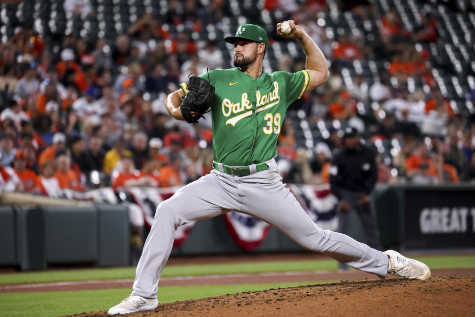 Oakland Athletics starting pitcher Kyle Muller (39) throws during the fourth inning of a baseball game against the Baltimore Orioles, Tuesday, April 11, 2023, in Baltimore. (AP Photo/Julia Nikhinson)