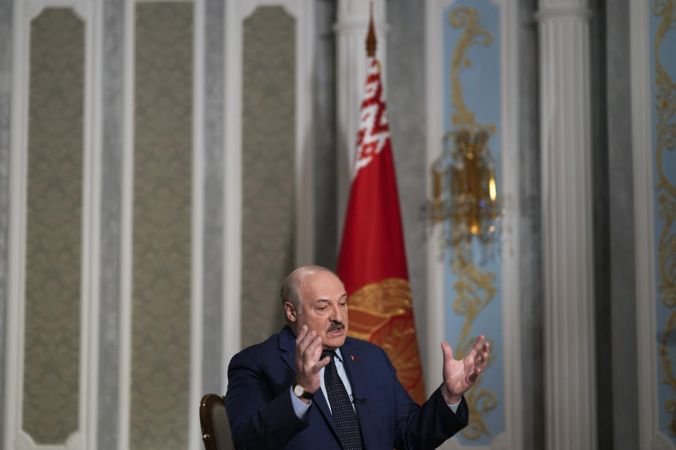 Belarus President Alexander Lukashenko speaks during an interview with The Associated Press at the Independence Palace in Minsk, Belarus, Thursday, May 5, 2022. (AP Photo/Markus Schreiber)