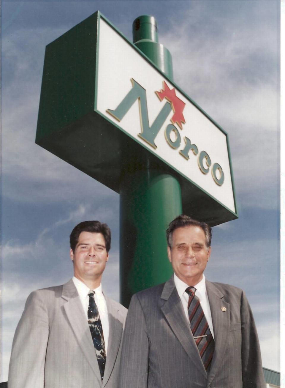 Jim Kissler, left, stands in front of Norco’s medical supply building with his late father, Larry Kissler, in 2002.