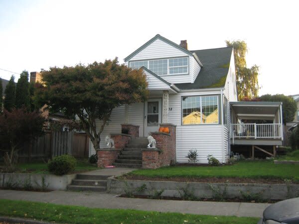 Before: The home’s original porch had been closed off by a previous renovation.