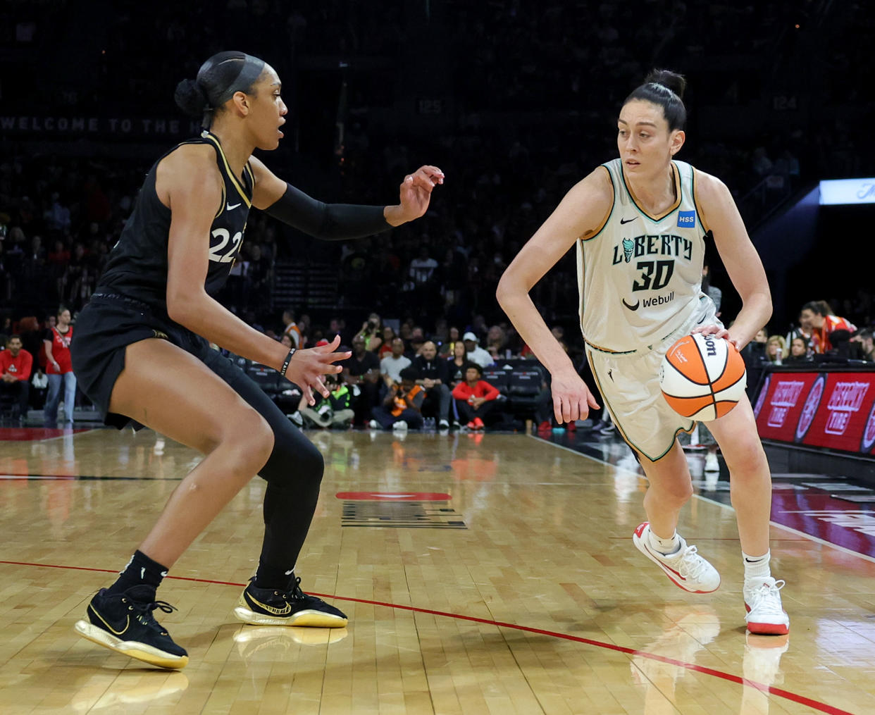 Breanna Stewart of the New York Liberty drives against A'ja Wilson of the Las Vegas Aces during Game 1 of the 2023 WNBA Finals. Both were named to the All-WNBA First Team on Sunday. (Photo by Ethan Miller/Getty Images)