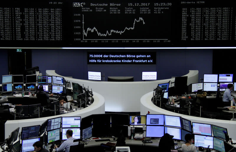 FILE PHOTO - The German share price index, DAX board, is seen at the stock exchange in Frankfurt, Germany, December 15, 2017. REUTERS/Staff/Remote