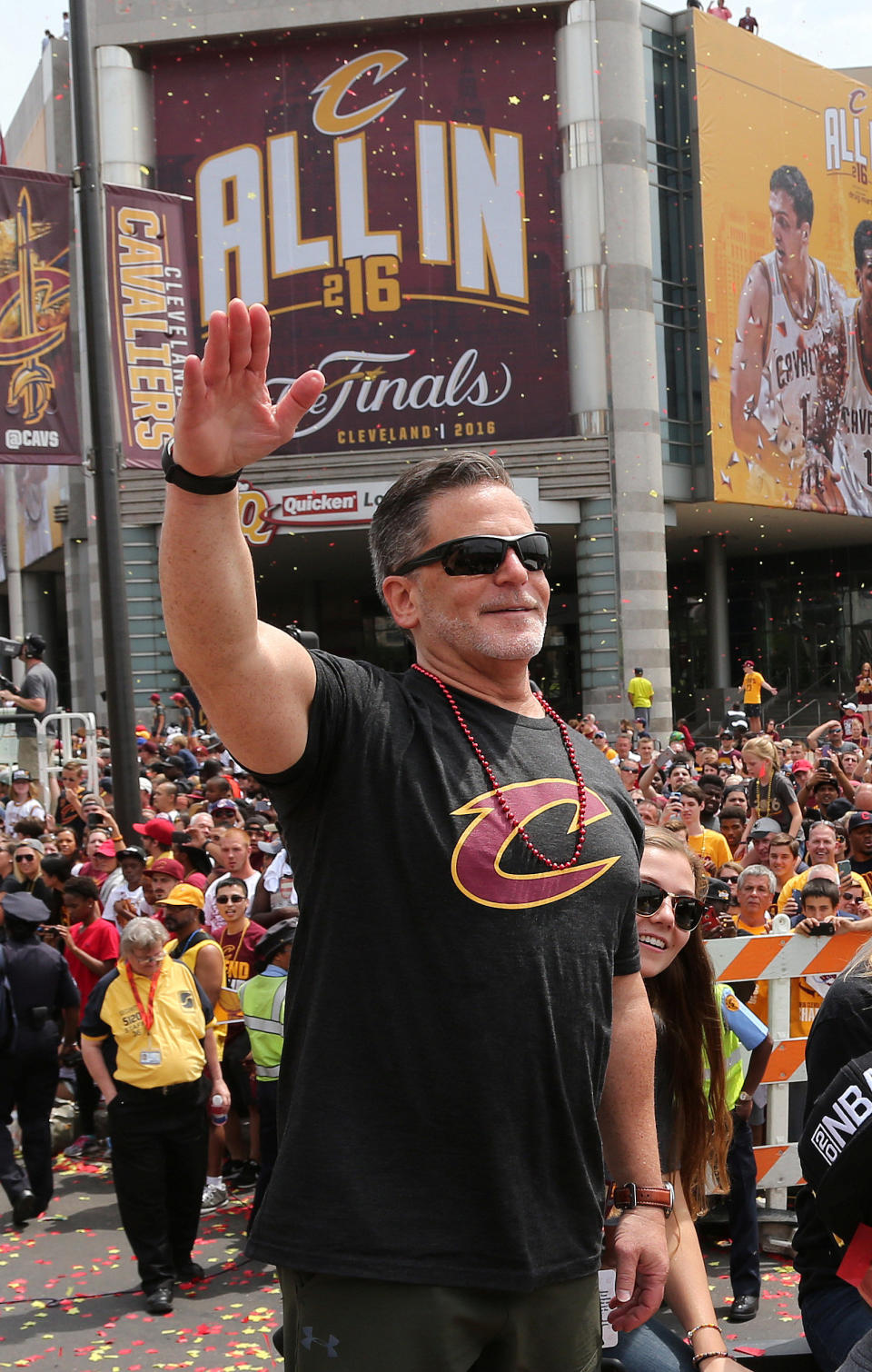 Cleveland Cavaliers owner Dan Gilbert waves to the crowd during a parade to celebrate winning the 2016 NBA Championship in downtown Cleveland, Ohio, U.S. June 22, 2016. REUTERS/Aaron Josefczyk