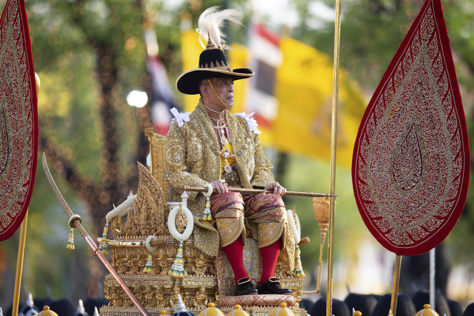 Thailand’s King Maha Vajiralongkorn is carried on a palanquin through the streets outside the Grand Palace for the public to pay homage during the second day of his coronation ceremony in Bangkok, Sunday, May 5, 2019. Vajiralongkorn was officially crowned Saturday amid the splendor of the country's Grand Palace, taking the central role in an elaborate centuries-old royal ceremony that was last held almost seven decades ago. (AP Photo/Wason Wanichorn)