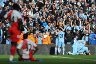 Manchester City's Argentinian striker Sergio Aguero (R) celebrates his late winning goal with team-mates during the English Premier League football match between Manchester City and Queens Park Rangers at The Etihad stadium in Manchester, north-west England on May 13, 2012. Manchester City won the game 3-2 to secure their first title since 1968. AFP PHOTO/PAUL ELLIS RESTRICTED TO EDITORIAL USE. No use with unauthorized audio, video, data, fixture lists, club/league logos or 'live' services. Online in-match use limited to 45 images, no video emulation. No use in betting, games or single club/league/player publications.PAUL ELLIS/AFP/GettyImages