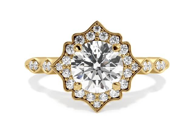 Vintage Floral Halo Diamond Engagement Ring. Image via Ritani.