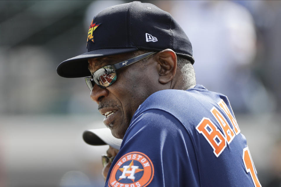 Houston Astros manager Dusty Baker watches batting practice before a spring training baseball game against the Detroit Tigers Monday, Feb. 24, 2020, in Tampa. (AP Photo/Frank Franklin II)