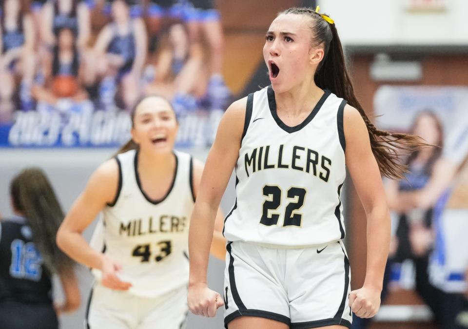 Noblesville Millers guard Reagan Wilson (22) yells in excitement Saturday, Feb. 3, 2024, during the IHSAA girls basketball sectional Class 4A game at Hamilton Southeastern High School in Indianapolis. The Noblesville Millers defeated the Hamilton Southeastern Royals, 49-45.