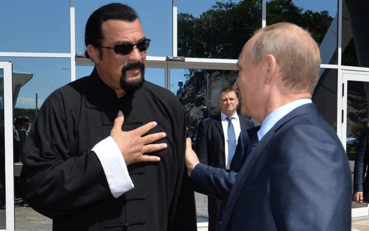 Russian President Vladimir Putin with Steven Seagal in Vladivostok, 2015