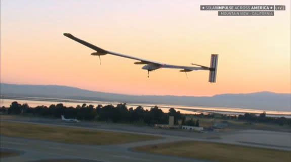 Solar Impulse flies over the runway at Moffett Airfield in California shortly after takeoff on May 3, 2013.