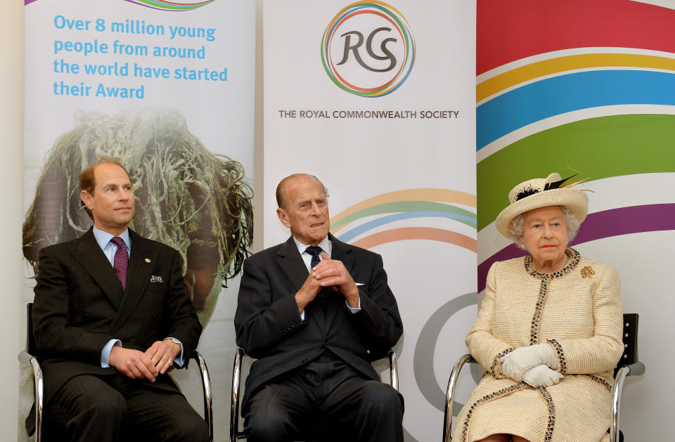 LONDON, ENGLAND - MARCH 12:  (L-R) Prince Edward, Earl of Wessex, Prince Philip, Duke of Edinburgh and Queen Elizabeth II listen to a welcome address at the start of their visit to the Royal Commonwealth Society in Westminster on March 12, 2014 in London, England.  (Photo by John Stillwell - WPA Pool/Getty Images)