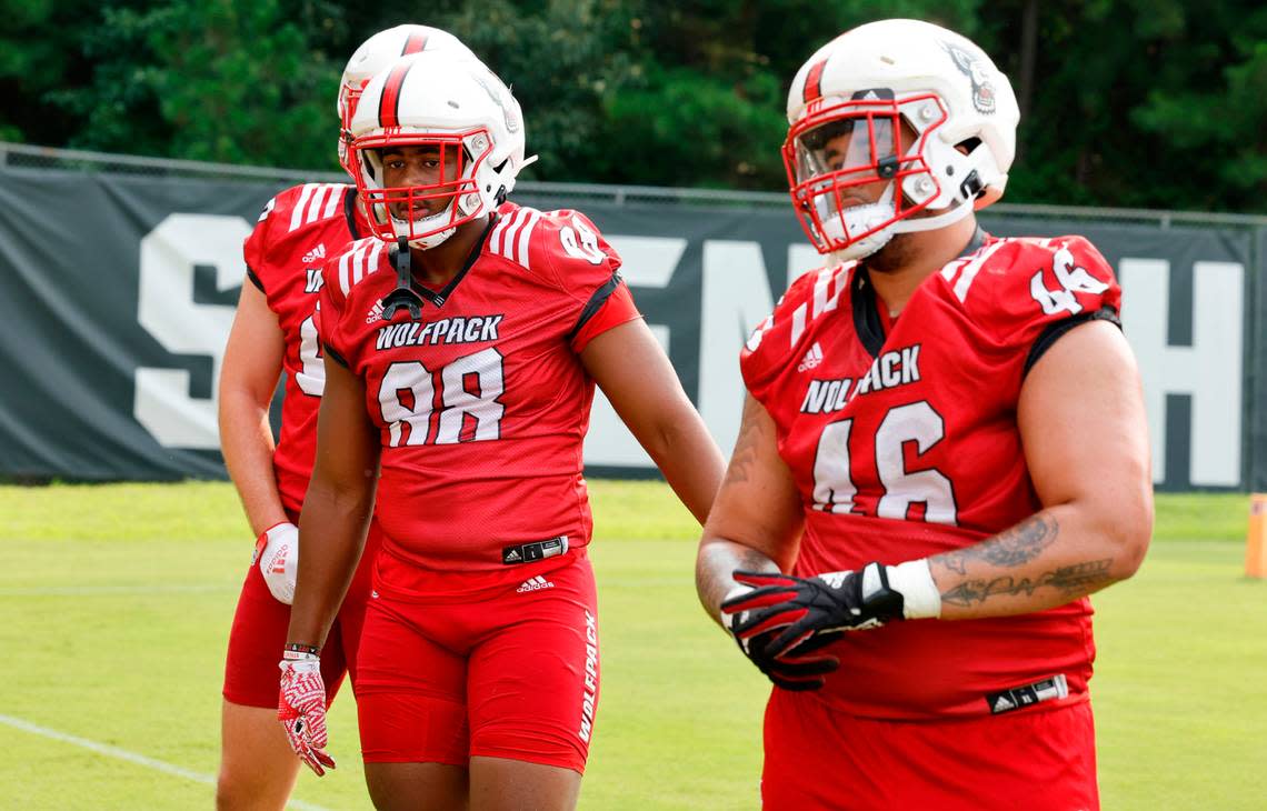 N.C. State defensive end Isaiah Shirley (88) and defensive lineman Nick Campbell (46) wait for a drill during the Wolfpack’s first fall practice in Raleigh, N.C., Wednesday, August 2, 2023. Ethan Hyman/ehyman@newsobserver.com