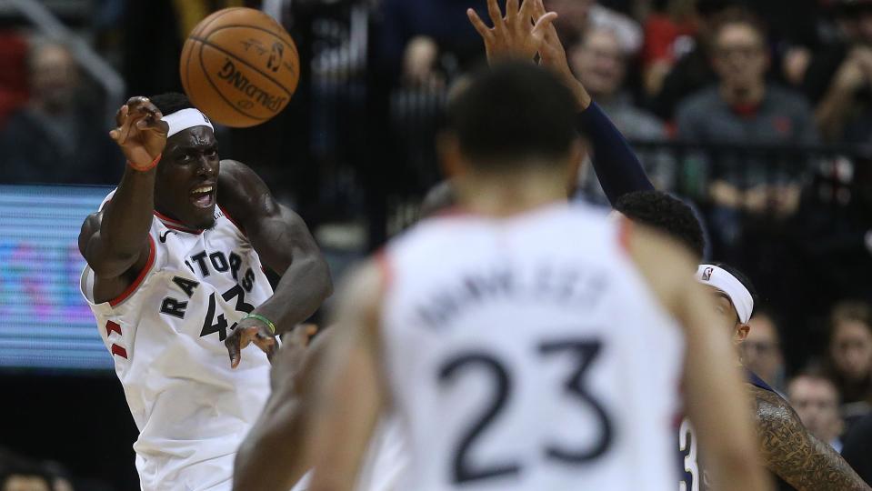 TORONTO, ON- OCTOBER 22  -   Toronto Raptors forward Pascal Siakam (43) makes a pass to Toronto Raptors guard Fred VanVleet (23) as the Toronto Raptors open the season against the New Orleans Pelicans with a 130-122 overtime win  at  Scotiabank Arena in Toronto. October 22, 2019.        (Steve Russell/Toronto Star via Getty Images)