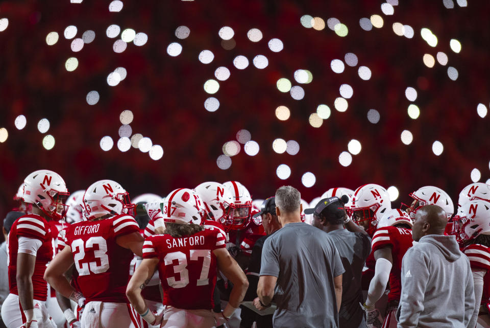 Nebraska huddles between the 3rd and 4th quarter during an NCAA football a game between Nebraska and Indiana, Saturday, Oct. 1, 2022 at Memorial Stadium in Lincoln, Neb. (Noah Riffe/Lincoln Journal Star via AP)