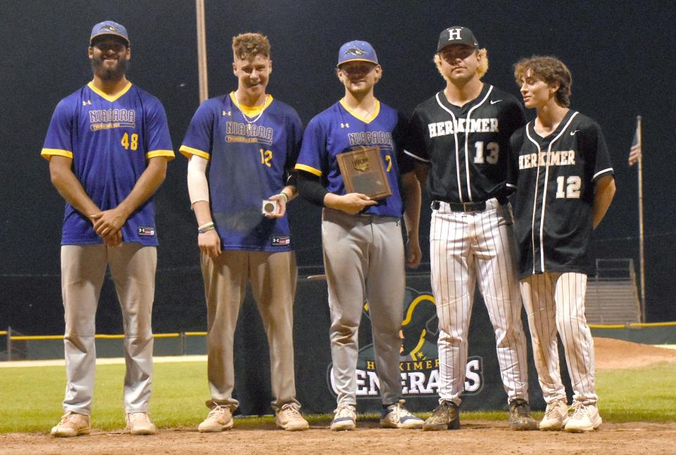 NJCAA Region III Division III baseball Final Four most valuable player Ryan Birchard (center) poses with his plaque and all-star selections Kyle Menaker and Andrew Fairbrother from Niagara County Community College and Ryan Packard and Kyle Caccamise from Herkimer College (from left) following Saturday's championship game.