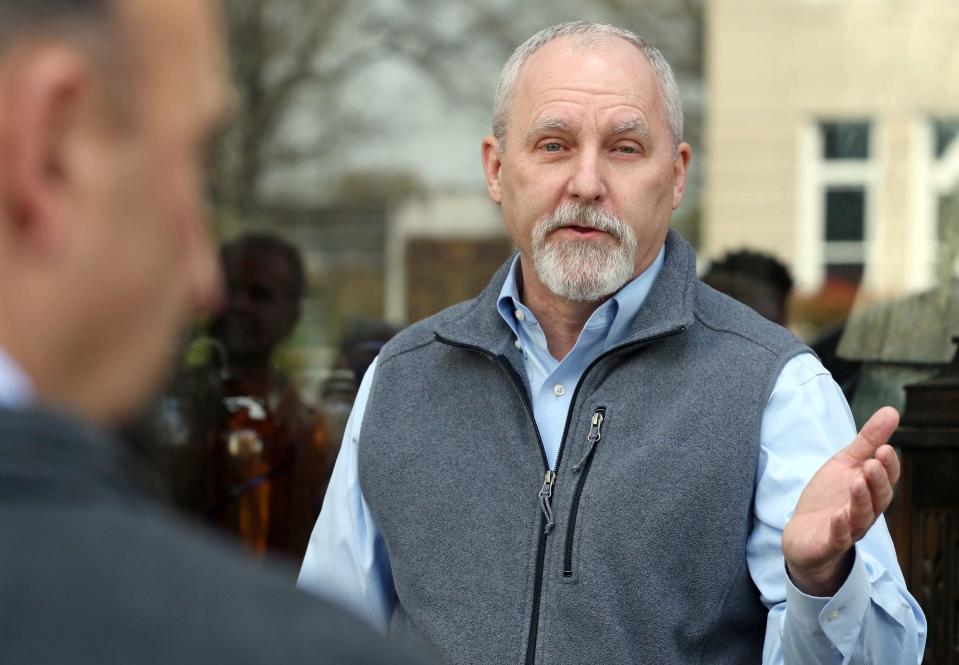 City Manager Rick Howell thnaks everyone during a surprise celebration for him held Thursday afternoon, March 16, 2023, outside the Dragonfly Wine Market in Shelby.