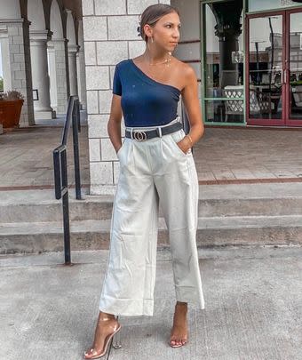 A pair of cropped palazzo pants with a paper bag-style waist