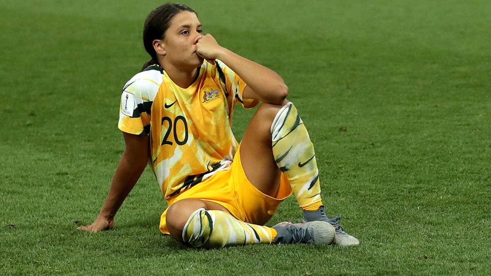 Sam Kerr looks dejected after losing the penalty shootout. (Photo by Hannah Peters - FIFA/FIFA via Getty Images)