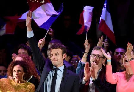 Emmanuel Macron, candidate in France's 2017 French presidential election, is seen between crowd members as he delivers an address for French nationals in London, Britain, February 21, 2017. REUTERS/Toby Melville