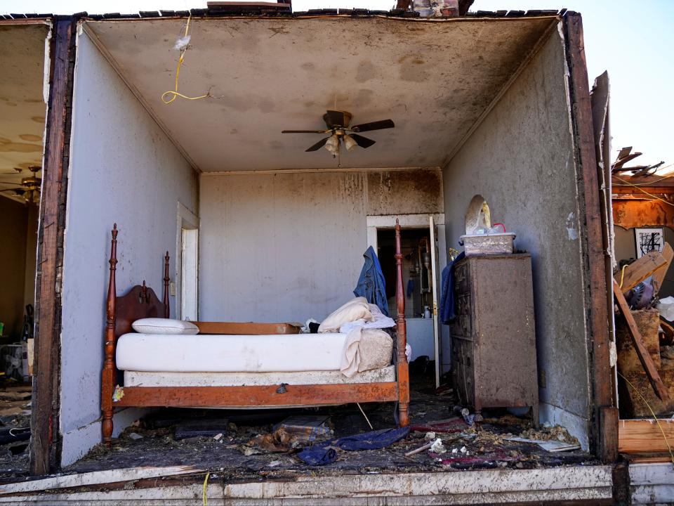 The bedroom of Rick Foley, 70, is seen without a wall after a devastating outbreak of tornadoes ripped through several U.S. states in Mayfield, Kentucky, U.S. December 11, 2021 (REUTERS)