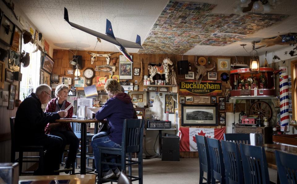 Patrons enjoy a meal at the Last Chance Saloon in Wayne, Alta. THE CANADIAN PRESS/Jeff McIntosh