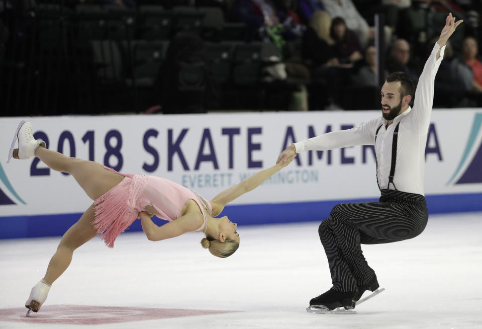 Ashley Cain and Timothy Leduc perform during the pairs short program at Skate America, Friday, Oct. 19, 2018, in Everett, Wash. (AP Photo/Ted S. Warren)