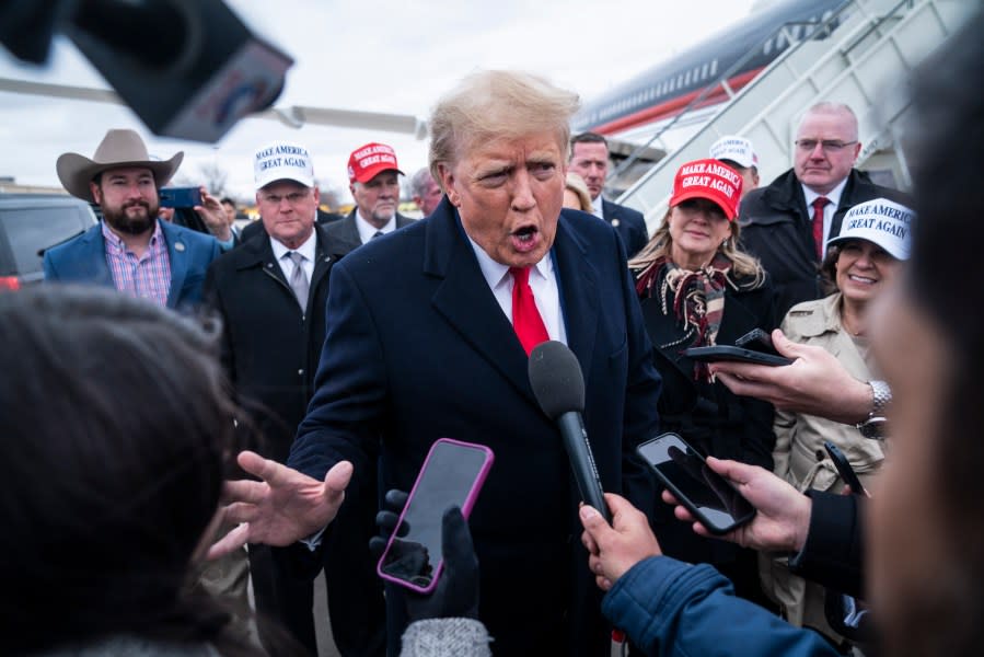 Former President Donald Trump speaks with reporters as he lands at Quad City International Airport en route to Iowa on Monday, March 13, 2023, in Moline, Illinois. (Photo by Jabin Botsford/The Washington Post via Getty Images)