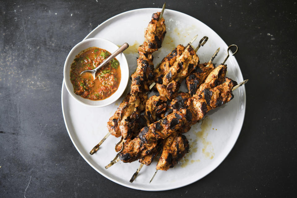 This image released by Milk Street shows a recipe for Turkish-style chicken kebabs. (Milk Street via AP)
