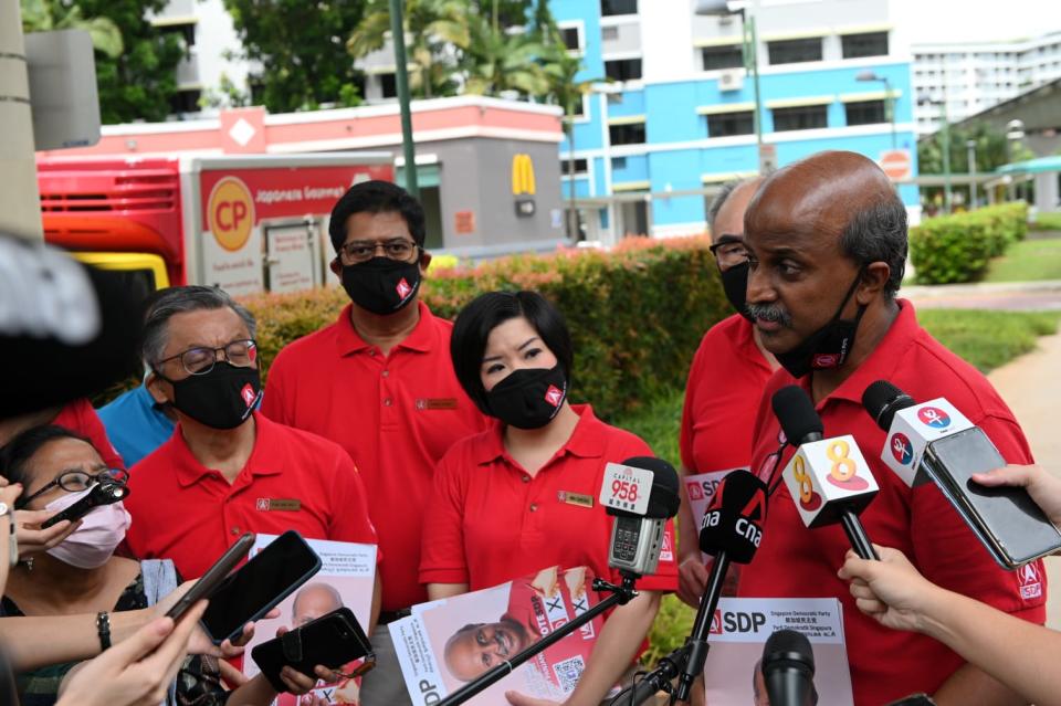 Singapore Democratic Party's members speaking to the media on 8 July. (PHOTO: Yahoo News Singapore/Joseph Nair)