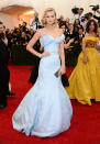 <p>Toni Garrn showed how to do chainstore chic at the 2014 MET Ball in a baby blue Topshop gown.</p>