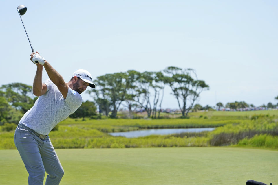 Dustin Johnson hits his tee shot on the third hole during the second round of the PGA Championship golf tournament on the Ocean Course Friday, May 21, 2021, in Kiawah Island, S.C. (AP Photo/Matt York)