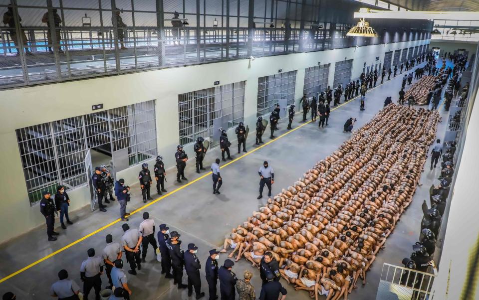 Dystopian images of shaven-headed inmates shocked global opinion - EL SALVADOR-PRISON-GANGS