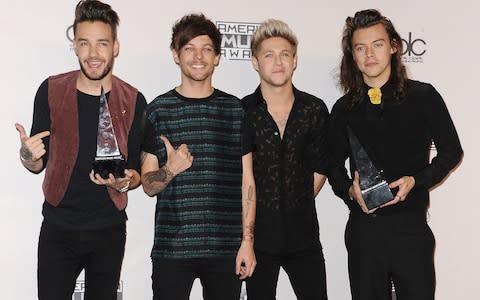 2015 ID, minus Zayn, at the American Music Awards, LA. From left: Liam, Louis, Niall and Harry - Credit: Getty Images